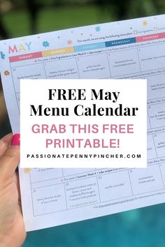 a person holding up a menu with the text free may menu calendar grab this free printable