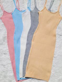 The Skye ribbed mini dress with adjustable spaghetti straps is the perfect dress for a day out with friends at the beach, shopping or even a concert. The stretch fabric will keep you comfortable all day. It comes in 5 colors and is the perfect piece to wear with your favorite denim jacket. Pair it with some boots or sandals and be on your way! You will love this versatile piece. Perfect for any season! With so many ways to wear this simple dress, I'm sure you'll fall in love as much as I have! Ribbed Mini Beach Dress, Beach Mini Ribbed Dress, Trendy Ribbed Mini Dress For Day Out, Beach Camisole Mini Dress, Stretch Ribbed Mini Dress With Spaghetti Straps, Beach Mini Dress Camisole, Casual Solid Mini Dress With Seamless Detail, Casual Solid Seamless Mini Dress, Summer Dresses With Stretch And Tank Straps