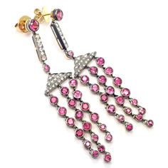 These earrings are for pierced ears.  Metal: 18k yellow gold  Measurements: 2 3/4" x 1/2"  Weight: 15.9 grams  Stones: 42 rose cut diamonds SI1 clarity, H color total weight approximately 1ct 42 pink sapphires total weight approximately 7ct  Hallmarks: Laura Munder 750    Please read description for most accurate dimensions and use QA to inquire on any additional details. Pink Diamond Accent Earrings For Formal Occasions, Formal Pink Earrings With Diamond Accents, Pink Fine Jewelry Earrings, Pink Diamond Earrings Fine Jewelry, Pink Diamond Drop Earrings, Pink Diamond Drop Earrings In Fine Jewelry Style, Pink Diamond Earrings For Pierced Ears, Pink Diamond Earrings With Diamond Accents, Luxury Pink Sapphire Earrings For Formal Occasions