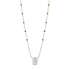 Discover the Deepika Mangalsutra, where timeless tradition meets modern sophistication. This elegant necklace features a vertically set brilliant oval certified lab-grown diamond in a fixed pendant, with options ranging in diamond size and grade. Crafted from luxurious 18k gold—available in yellow, white, or rose—it is accented with five evenly spaced black beads on each side of the chain and a diamond ranging in size and grade. The Deepika Mangalsutra transcends mere adornment; it's an embodime Deepika Mangalsutra, Black Beads Mangalsutra Design Diamond Pendant, Caratlane Diamond Mangalsutra, Elegant Black Luxury Mangalsutra, Dimand Pendent Mangalsutra, Brass High Gold Mangalsutra, 18k Gold Chain, Elegant Necklace, Elegant Necklaces