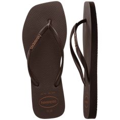 The Havaianas Slim Square Logo Pop Up is a model favorite. The square-toe silhouette is sleek, modern and perfect for any closet. Available in neutral tones, discover our newest version with a metallic logo detail on the strap for extra sophistication. Upper: 100% PVC Outsole: 98.5% rubber, 1.5% PU Thong style Square shaped Cushioned footbed with textured rice pattern and rubber flip flop sole Made in Brazil Black Luxury Flip Flops, Cheap Leather Flip Flops For Beach, Luxury Leather Flip Flops, Luxury Leather Flat Flip Flops, Cheap Black Flip Flops For Summer, Luxury Classic Square Toe Sandals, Luxury Classic Slide Sandals, Luxury Black Summer Flip Flops, Affordable Black Flip Flops For Beach Season