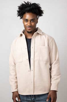 Rock this season’s hottest trend in this 1897 Original Heavy Shacket for Men in Cream! Wear this one buttoned all the way up for a cozy shirt look, or over a white tee as a layering piece. You can’t go wrong with the soft fleece, neutral color, and comfortable design! Features: 1897 Original Style: MJ110-CREAM Color: Cream 60`% Cotton 35% Polyester 5% Spandex Men’s shackets Long sleeves Sturdy shoulders Button sleeve cuffs and fold down collar Full button-down closure Two chest pockets Measurements from size large: Length from back center: 29” Chest: 40” Machine wash cold, hang dry Luxury Men's Shacket With Patch Pockets, Luxury Men's Collared Shacket, Beige Single-breasted Button-up Shacket, Cream Button-up Shacket With Pockets, Beige Collared Single-breasted Shacket, Cream Shirt, Youth Shoes, Boutique Tops, Jumpsuit Shorts Rompers