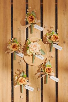 flowers are placed on top of wooden boards