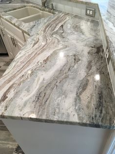 a marble counter top in a kitchen