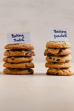 three cookies stacked on top of each other with sticky notes attached to their centers that say baking is possible