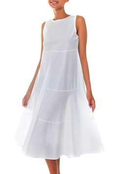 By Arthur Karvan this delightful knee-length sun dress cascades in tiers from a sleeveless bodice. Its scoop neck and easy fit make this cool cotton dress a classic. Spirit Clothing, Fair Trade Clothing, White Sundress, White Cotton Dress, Sleep And Loungewear, Sun Dress, Knee Length Dresses, Cotton Dress, Online Womens Clothing