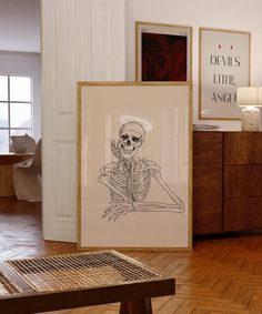 a drawing of a skeleton sitting on top of a wooden floor next to a table