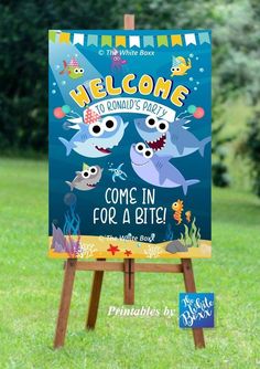 a welcome sign for a baby shark themed birthday party with an ocean theme and under the sea theme