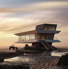 a house on the beach with an atv parked next to it