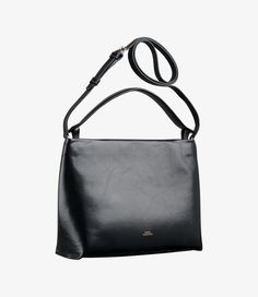 - Elegant minimalist bag. - Magnetic closure. - Removable strap to wear the bag on the shoulder or across the chest. - Handle with embossed A.P.C. logo to carry the bag by hand. - One interior zip pocket. - Embossed goldtone "A.P.C. Rue Madame Paris" logo. Business Rectangular Hobo Bag With Detachable Handle, Business Hobo Bag With Detachable Strap Tote, Business Hobo Bag With Detachable Handle, Business Hobo Shoulder Bag With Detachable Strap, Business Hobo Bag With Detachable Strap, Classic Hobo Bag With Detachable Top Handle, Classic Hobo Bag With Detachable Strap And Top Handle, Business Hobo Bag With Top Handle And Adjustable Strap, Classic Business Hobo Bag With Top Carry Handle