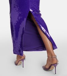 Sequined Halterneck Gown in Purple - La Quan Smith | Mytheresa Purple Maxi Dress For Party, Full Length Sequined Evening Dress For Parties, Glamorous Glitter Maxi Dress For Evening, Purple Sequined Floor-length Evening Dress, Purple Sequin Dress With Contrast Sequin For Evening, Glamorous Purple Sequin Dress, Purple Contrast Sequin Evening Dress, Purple Halter Neck Maxi Dress For Party, Purple Sequin Evening Dress For Party Season