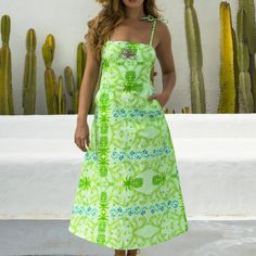 Get ready to unleash your inner flirt in our chic midi-length linen Baby Dress - it's a charming, and absolutely irresistible linen piece that demands attention! Crafted from sustainable linen fabric, this is more than just a dress; it's a passionate affair with sustainability. Embellished with a playful pineapple print in lively lime green, chartreuse and turquoise hues, it's a vivacious explosion of sass and style. The moment you slip into this creation, you'll reign as the epitome of summer c Summer Linen Midi Dress With Floral Print, Vacation Linen Dresses With Floral Print, Beach Linen Dress With Floral Print, Floral Print Linen Dresses For Brunch, Linen Sundress Midi Dress For Vacation, Bohemian Linen Midi Dress For Vacation, Green Cotton Sundress Midi Dress, Green Knee-length Midi Dress For Vacation, Floral Print Linen Dress For Vacation