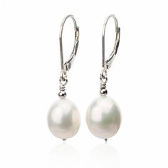 Classic and simple earrings for everyday luxury. Beautiful freshwater cultured teardrop pearls are hung from a sterling silver and mirror bead to create a polished and versatile design. These pearl dangle earrings are a pure and elegant addition to any outfit. Practical and heirloom gift for your everyday hardworking professional woman. Pearl Type: Freshwater Cultured Pearl Shape: Teardrop Pearl Luster: AAA Pearl Color: Natural White Pearl Size: 8x10mm Leverbacks: Sterling Silver, 14K Gold Fill, Pearl Teardrop Earrings, Unique Bridal Jewelry, Pearl Gifts, Simple Pearl, White Pearl Earring, Pearl Dangle Earrings, Teardrop Dangle Earrings, Professional Jewelry, Earrings Pearl