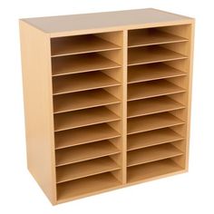 a large wooden shelf with many compartments