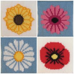 four knitted flowers are shown in different colors