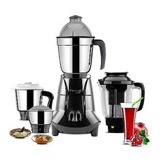 the blender is next to two cups and a drink in front of it on a white background