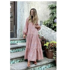 V Neck Dress With Long Sleeves With Elastic Cuffs. Ruffled Hem. Outer Shell 100% Cotton Fall Flowy Pink Maxi Dress, Flowy Pink Maxi Dress For Fall, Casual Long Sleeve Pink Maxi Dress, Pink Boho Dress For Beach In Fall, Pink Ruffled Maxi Dress For Fall, Pink Boho Dress For Fall Beach Occasion, Casual Pink Long Sleeve Boho Dress, Pink Maxi Dress For Fall, Pink Long Sleeve Midi Dress For Day Out