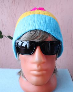 Feel bright, bold and beautiful in this premium hat Pansexual Pride Flag which is super stylish, soft, warm and comfy. If you are looking for hat to show off your LGBTQ+ Pride this Pansexual Hat is ideal for spending time outdoors, heading to events, festivals or just to brighten up your day. This Pride hat has a unisex style and is suitable for men and women. Suitable for all sizes. Care instructions: Hand wash in lukewarm water with detergent for delicate garments. Roll into a towel, squeeze i Playful Yellow Beanie Hat, Handmade Blue Beanie Cap, Multicolor Beanie Hat For Gift, Multicolor Beanie Hat Gift, Fun Blue Hats For Gifts, Fun Blue Hat For Gift, Fun Blue Hat, Playful Blue Hats For Gifts, Playful Blue Hat As A Gift