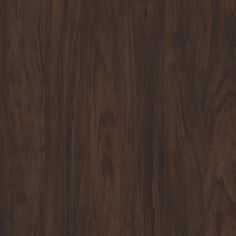 a close up view of the wood grains on this wooden flooring material, which is very dark brown