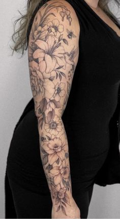 a woman with a tattoo on her arm