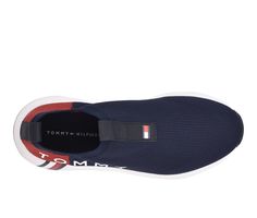 Lightweight and breathable fabric upper, Easy slip-on entry, Classic round toe, Cushioned EVA insole, Durable synthetic outsole, Tommy Hilfiger® branding details | Women's Tommy Hilfiger Aliah Sneakers in Navy Size 9 Medium Tommy Hilfiger Women, Shoe Carnival, Slip On Sneakers, Womens Sneakers, Breathable Fabric, Tommy Hilfiger, Slip On, Navy, Branding