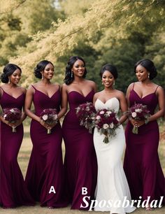 the bride and her bridesmaids pose for a photo