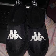 100% Authentic And Never Worn Black Slip-on Winter Slippers, Black Winter Slippers With Rubber Sole, Black Casual Slip-on Slippers, Casual Black Slip-on Slippers, Non-slip Slip-on Slippers For Streetwear, Black Non-slip Slippers With Round Toe, Black Non-slip Round Toe Slippers, Black Closed Toe Winter Slippers, Black Sporty Synthetic Slippers