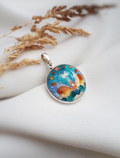 "Georgian cloisonne enamel pendant/Sterling silver jewelry/Colorful necklace/Hot enamel jewelry/Gift for her ... This pendant comes without chain!  ... Made to order... As you understand this pendant can't be absolutely similar to the one you see in the picture because its handmade. ... Handmade pendant with Georgian cloisonne enamel ... Used materials\" Sterling silver 999  Silver 925 Hot cloisonne enamel" Handmade Round Enamel Necklaces, Handmade Enamel Round Necklace, Handmade Enamel Round Necklaces, Handmade Round Enamel Necklace, Enamel Necklace With Cabochon Round Pendant, Enamel Cabochon Round Pendant Necklace, Enamel Medallion Necklace For Gift, Round Pendant Necklace With Enamel And Cabochon, Enamel Hallmarked Oval Pendant Necklace