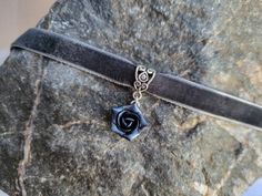 "Velvet choker necklace with handmade black pearl rose. The rose is made of polymer clay. Each petal made by hand. Rose about 15 mm/ 0,6\" across. Metal bail in silver color (Bails hole 5*4 mm/ 0,2*0,16 inch). Length of necklace is adjustable: 10-12 inches/ 25,4 - 30,5 cm 11-13 inches/ 28-33 cm 12-14 inches/ 30.5- 35.5 cm 13-15 inches/ 33-38 cm 14-16 inches/ 35.5 cm-40.5 cm 15-17 inches/ 38,1 cm- 43,2 cm 16-18 inches/ 40.6 cm- 45.7 cm 17-19 inches/ 43 cm - 48 cm 18-20 inches 19-21 inches Width of ribbon 10 mm / 0.4 inch If you need other length of necklace let me know and I will make it for you.   I make some custom orders. If you would like some items to be custom made or created for you in a special way, feel free to send an Etsy conversation with your requirements, and we can discuss th Handmade Gothic Choker As Gift, Handmade Gothic Choker Gift, Handmade Gothic Choker For Gift, Gothic Pendant Choker As A Gift, Elegant Rose Design Jewelry Choker, Elegant Rose Design Choker Jewelry, Elegant Rose Design Choker As Gift, Adjustable Rose Design Choker Necklace, Rose Design Choker As Gift