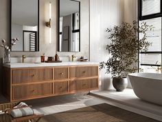 a bath room with a tub a sink and mirrors