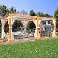 an outdoor living area with couches, tables and curtains on the side of it