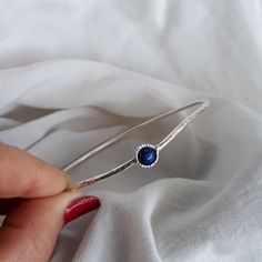 "Modern and simple Wave Hammered bangle for women. 2mm. Sterling silver wire stacking bangle is perfect in its simplicity. Gemstone bangle modern and trendy look. Summer jewelry, graduation gift. 6mm. Lapis Lazuli stone set in a decorated stone house. Layering bracelet, Everyday bracelet. Very important! to avoid mistakes, please make sure you have the right size. If you not sure then look at item photos and learn how to do it. Choose your length look at the picture to know how to take the right Sterling Silver Stackable Bangle For Anniversary, Adjustable Simple Bangle Jewelry, Adjustable Sterling Silver Round Bangle, Stackable Sterling Silver Bracelet, Sterling Silver Stackable Round Bracelet, Stackable Round Sterling Silver Bracelet, Sterling Silver Gemstone Bangle For Anniversary, Adjustable Round Bangle With Gemstone, Adjustable Gemstone Bangle