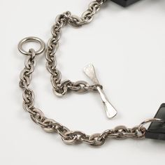 Stunning modernist bib necklace. Features a modern handmade geometric choker necklace. Each Lucite or Plexiglass extra-thick block is hinged so that all the pieces can be in motion and follow the wearer's movements. Transparent smoke gray-black color. A heavy silvered metal chain, all textured, with a large toggle closing clasp finishes the piece. No visible maker's mark.  Measurements: The necklace's total length is 26.75 in long (68 cm) - geometric elements range from 2 in to 2.75 in long (5 t Modern Rectangular Necklace, Modern Glass Necklaces For Formal Occasions, Modern Glass Necklaces For Formal Events, Modern Choker With Lobster Clasp, Modern Choker Jewelry With Lobster Clasp, Modernist Geometric Jewelry For Formal Occasions, Modern Rectangular Glass Jewelry, Modern Glass Chain Necklace, Modern Jewelry With Lobster Clasp