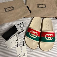 Gucci Sandal Rubber Gg Interlock White/Red/Green. Brand New. Never Worn. Original Box, 2 Dusters. Size 38 (Us 7) Designer Slides With Branded Insole For Beach, Designer Beach Slides With Branded Insole, Red Gucci Sandals For The Beach, White Gucci Slip-on Slides, White Flat Gucci Slides, Gucci Slides For Summer Beach, Gucci Casual Beach Slides, Designer White Gucci Slides, White Designer Gucci Slides