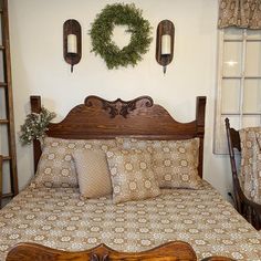 a bed with wooden headboard and foot board