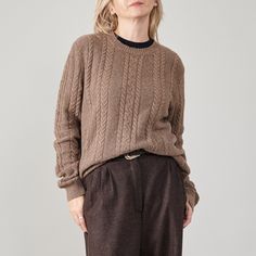 "Step into winter elegance with our Vintage Brown Alpaca Wool Crew Neck Sweater. This Women's L-XL sweater boasts a timeless cable knit design, expertly crafted from a sumptuous 75% alpaca blend. The earthy tone exudes sophistication, offering a versatile choice that effortlessly transitions from the office to winter holidays. Immerse yourself in the warmth and comfort of this super-cozy sweater, a harmonious blend of style and functionality. Its versatile design adapts to various occasions, ensuring you remain chic and snug all season long. Notably long, it caters perfectly to tall women, enhancing the sweater's overall appeal. Composition: 75% alpaca, 25% polyamide Condition: excellent Size on tag: 50 Precise measurements of the brown sweater while lying flat: Armpit to armpit: 59 cm | 2 Winter Office Outfit, Winter Office, Winter Pants, Wool Clothing, Cable Knit Jumper, Crew Neck Jumper, Pullover Sweater Women, Cozy Sweater, Tall Women