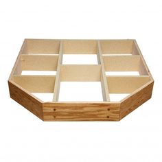 a wooden box with six compartments on it