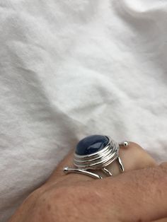 great color Deep blue Kyanite stone surrounded by a cool modern setting The setting is handcrafted in Sterling silver Size 7.5 Can be sized All rings are shipped in a nice gift box. Check out our over a THOUSAND great reviews Engraving is $4 per letter and is not always perfect depending on the piece. It can take a few days if the jeweler is busy. This is payable to Paypal Judithsltd@gmail.com Mermaid Ring, Silver Cocktail, Vintage Gothic, Blue Kyanite, Statement Ring, Promise Rings, 925 Sterling Silver Ring, Deep Blue, Vintage Rings