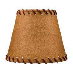 a brown lampshade with leather trimmings on the top and bottom part