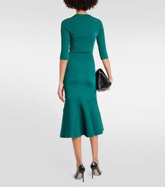 Material: 66% viscose, 19% polyamide, 13% metallic fibres, 2% elastane.Care instructions: dry clean.Made in China.Designer color name: Green.Closure: buttoned front.True to size.Fitted.Stretchy fabric.Cropped.The model seen in the picture is 178cm-5'10' and wearing a size UK 8 Fitted Fine Knit V-neck Outerwear, Fitted Winter Evening Cardigan, Fitted Evening Cardigan For Winter, Fitted Fine Knit Cardigan, Winter Evening Fitted Cardigan, Fitted Evening Cardigan For Spring, Spring Evening Fitted Cardigan, Elegant Fitted Fine Knit Outerwear, Chic Fitted Cardigan For Workwear