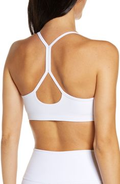 Slim racerback straps enhance the sporty, modern style of a space-dyed sports bra that's ideal for medium-impact activities. 10 1/2" length (size Medium) Medium-impact support Lined 87% polyester, 13% Lycra® spandex Machine wash, tumble dry Made in the USA of imported fabric Women's Clothing Go-dry Racerback Sports Bra For Yoga, Functional T-back Sports Bra, Medium Support T-back Sports Bra, Go-dry Racerback Sports Bra For Gym, Supportive Racerback Sports Bra With Go-dry Technology, White T-back Sports Bra For Workout, Sporty Racerback Sports Bra With Adjustable Straps, White T-back Activewear For Athleisure, Go-dry Racerback Sports Bra For Light Sports