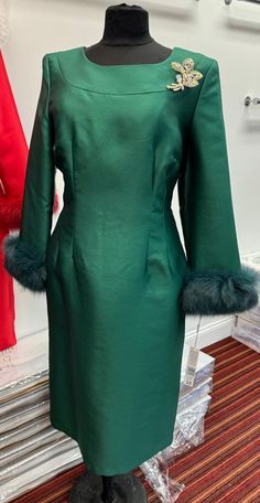 Lily and Taylor 4825 1 piece Novelty Dress Colors: Black, Green Multi, Hunter Green, Red, Royal Blue Sizes: 4, 6, 8, 10, 12, 14, 16, 18, 20, 22, 24 Matching Fur Headband Available A28 Matching Fur Shawl Available A62 Winter Dresses With Fitted Bodice And Long Sleeves, Elegant Fitted Christmas Dresses, Elegant Fitted Dress For Christmas, Fitted Long Sleeve Dress For Holiday, Fitted Holiday Dresses, Green Formal Dress For Winter, Green Formal Winter Dress, Fitted Knee-length Christmas Dresses, Formal Christmas Knee-length Dresses