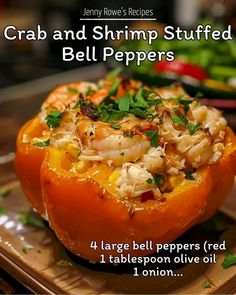 an image of crab and shrimp stuffed bell peppers on a cutting board with text overlay