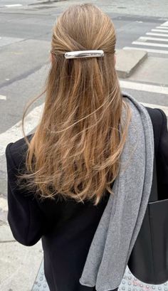 the back of a woman's head with long hair