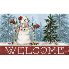 a welcome sign with a snowman and christmas trees