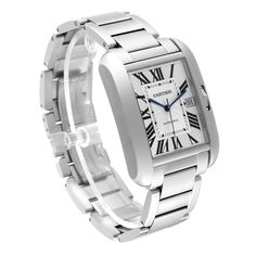 Cartier Tank Anglaise XL Steel Automatic Mens Watch W5310008. Automatic self-winding movement. Stainless steel case 47mm x 36.2 mm. Case thickness 9.82 mm. Crown set with a faceted blue spinel cabochon. . Scratch resistant sapphire crystal. Silver   guilloche dial. Painted black Roman numerals. Sword shaped blued steel hands. Secret Cartier signature at X. Date calendar window at 3 o'clock aperture. Secret Cartier signature at VII. Stainless steel bracelet with with deployant buckle. Fits 7 3/4" Cartier Tank Anglaise, Rolex Date, Blue Spinel, Cartier Tank, Date Calendar, Breitling Navitimer, Beautiful Watches, Roman Numerals, Swiss Watches