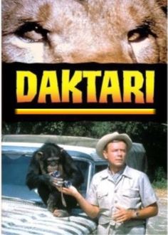 the movie poster for daktari features a man holding a dog and a gorilla