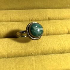 Gorgeous Sterling Silver Turquoise Vintage Ring Size 8 Native American finely crafted design with blue turquoise round stone. All Native Americans believe that the earth is living and all things are precious. Turquoise is no exception, representing life, and is highly revered. FREE Shipping via USPS, Allow from 2 - 7 Days for DeliveryOnly One Available Round Amazonite Jewelry With Natural Stones, Handmade Crystal Ring With May Birthstone, Bohemian Round Jade Jewelry, Blue May Birthstone Rings, Adjustable Green Turquoise Chrysocolla Ring, Adjustable Chrysocolla Turquoise Ring, Adjustable Turquoise Ring In Sterling Silver For Healing, Natural Stone Rings For May Birthstone, Green Chrysocolla Rings With Natural Stones