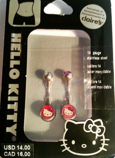 two hello kitty earrings are in the package