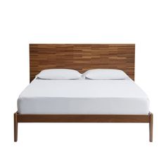 the bed is made with white sheets and wood slats on it's headboard